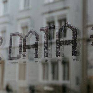 Grey sign saying data in capital letters.